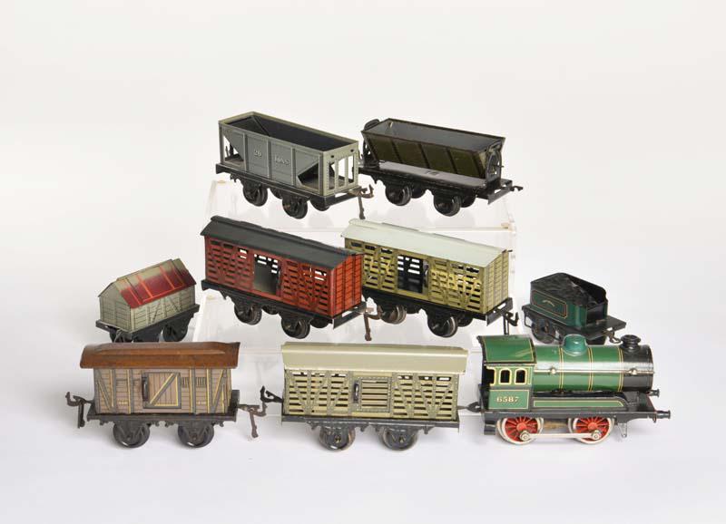 Bing, Lok + 7 Wagen: Bing, Loco + 7 Wagons, Germany, gauge 0, part. paint d., C 2+/2