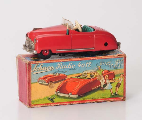 Schuco: Schuco, radio car 4012, US Z. Germany, 16cm, tin, windup and musicwork ok, original box condition 2-3, condition 1- Beschreibung: Schuco, Radio Auto 4012, US Z. Germany, 16cm, Blech, Uhrwerk und Musik
