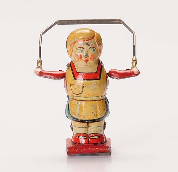 Girl: Girl with skipping rope. W-Germany. windup ok. coloured litho. condition 1-. Deutsche Beschreibung: Mädchen mit Springseil. W-Germany. 9 cm. Uhrwerk ok. bunte Litho. Z 1-.