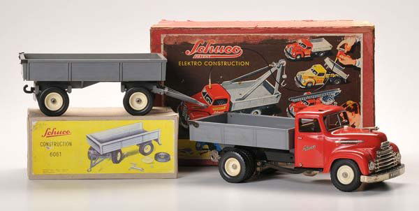 Schuco: Schuco. Electric Construction- Truck with Trailer. W.-Germany. 48cm. original box condition 2-3. condition 1- Deutsche Beschreibung: Schuco. Elektro Konstruktions- LKW mit Anhänger. W.-Germany. 48cm