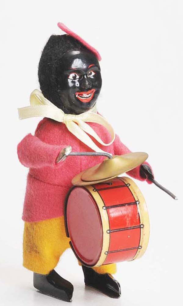 Schuco: English Description: Schuco-Replication, Black Musician, 11cm, windup ok, clothes a bit dirty, apart from that very good, condition 1 Deutsche Beschreibung: Schuco-Nachbildung, Schwarzer Musikant, 11