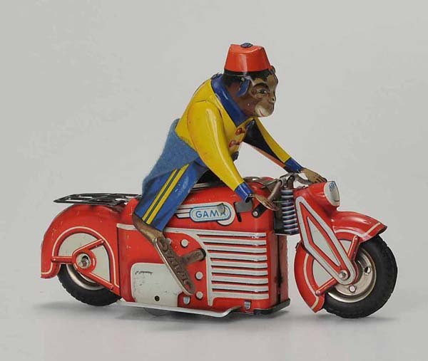 GAMA: English Description: GAMA, Monkey-Motorbike, US Zone Germany, tin, windup ok, minimal paint damage, condition 2+, Deutsche Beschreibung: GAMA, Affen-Motorrad, US Zone Germany, 17,5 cm, Blech, Uhrwerk 