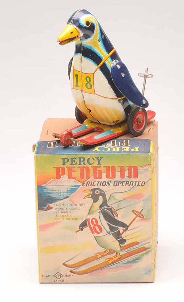 TN: English Description: TN, skying Penguin, Japan, 12cm, tin, friction ok, original box condition 1, condition 1 Deutsche Beschreibung: TN, skifahrender Pinguin, Japan, 12cm, Blech, Friktion ok, Okt. Z 1