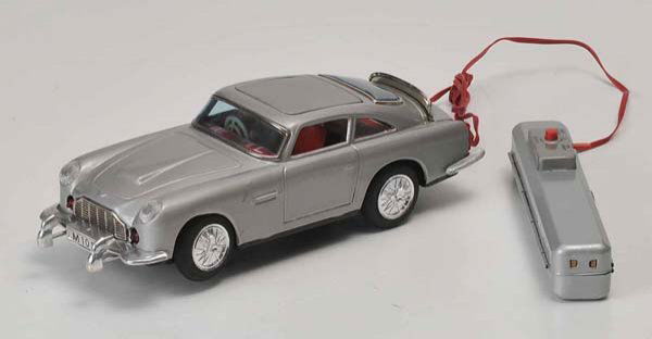 Gibert: English Description: Gibert, James Bond Aston Martin, Japan, 30 cm, tin, battery drive defective, beggar+1 wheelcap are missing, condition 2 Deutsche Beschreibung: Gibert, James Bond Aston Martin, Ja