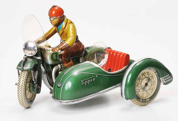 TippCo: English Description: TippCo, Sidecar Motorcycle, US Z. Germany, 20cm, tin, windup ok, 1 window minimal warped, apart from that condition 1 Deutsche Beschreibung: Tipp&Co, Beiwagenmotorrad, US Z. Germ