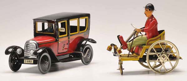 Convolute Tin Toys: English Description: Convolute Tin Toys: Taxi, Tricycle, ca. 13-19cm, tin, 2x windup ok, good condition Deutsche Beschreibung: Konvolut Blechspielzeug: Taxi, Dreirad, ca. 13-19cm, Blech, 2x Uhrwerk o