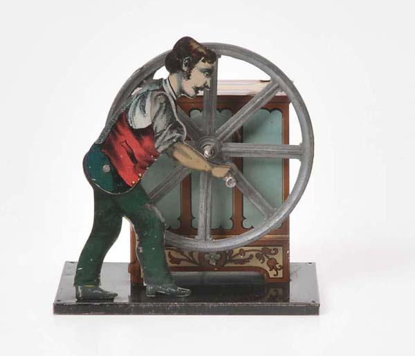 Carette: Carette, drive model Hand Organ Musician, germany prewar, 12 cm, tin, music box works Deutsche Beschreibung: Carette, Antriebsmodell Drehorgelspieler, Germany VK, 12 cm, Blech, Spieluhr funktioniert(2