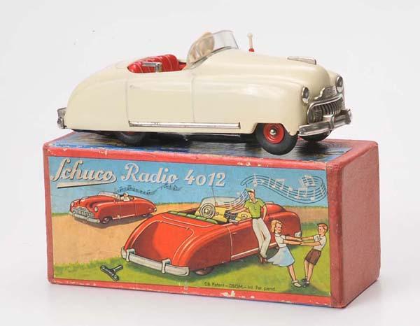 Schuco: Schuco, Radio Car 4012, W-Germny, 16 cm, windup and drive ok, original box condition 1-2, condition 1 Deutsche Beschreibung: Schuco, Radioauto 4012, W-Germany, 16 cm, Uhrwerk und Antrieb ok, Okt. Z 1-
