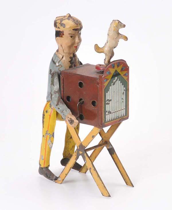 Issmayer: Issmeyer, Organ Grinder, Germany prewar, tin, windup ok, paint damage, good original condition, only known example Deutsche Beschreibung: Issmeyer, Drehorgelspieler, Germany VK, 18cm, Blech, Uhrwerk o