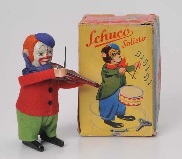 Schuco: Schuco,'Clown with violin and Red Jacket', W-Germany, 12 cm, windup ok, original box condition 3-4, one part missing, condition 1 Deutsche Beschreibung: Schuco, Clown mit Geige und roter Jacke, W-Germ