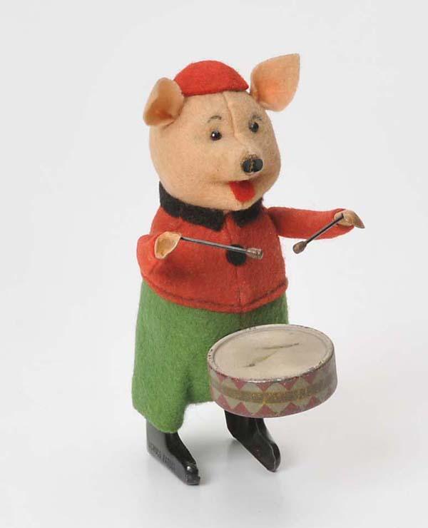 Schuco: Schuco, Dancing Figure with Drum, Germany, windup ok, condition 1-2, Deutsche Beschreibung: Schuco, Tanzfigur Schweinchen mit Trommel, Germany, 12 cm, Uhrwerk ok, Z 1-2, (2214)