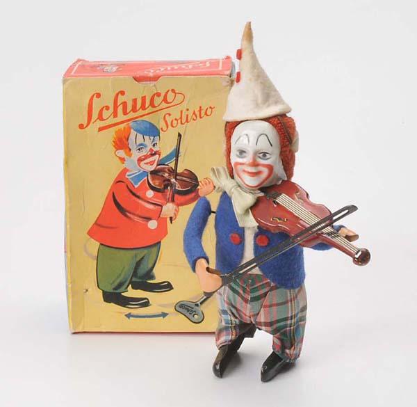 Schuco: Schuco, Dancing Figure Solisto Clown with Violine, W.-Germany, 12cm, tin, windup ok, functions ok, original box condition 1-, hat a little dirty, otherwise very good Deutsche Beschreibung: Schuco, Tan