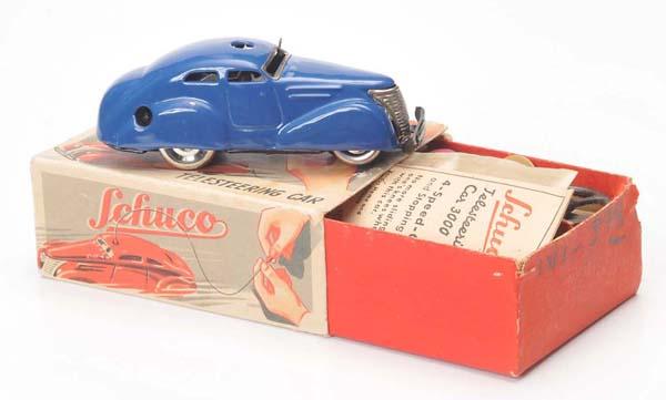 Schuco: Schuco, Remote Control Car 3000, Germany prewar, tin, windup ok, original box condition 1-, condition 1- Deutsche Beschreibung: Schuco, Fernlenkauto 3000, Germany VK, 10,5cm, Blech, Uhrwerk ok, Okt Z