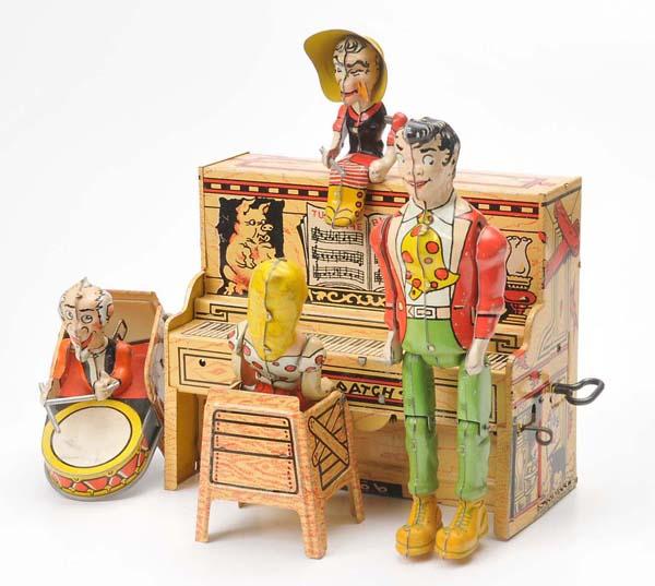 Unique Art: Unique Art, Lil Abner Band, USA, tin, functions ok, condition 1-2 Deutsche Beschreibung: Unique Art, Lil Abner Band, USA, 23cm, Blech, Funktionen ok, Z 1-2, (2214)