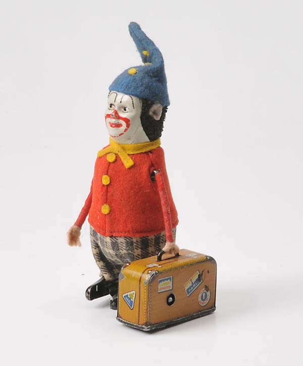 Schuco: Schuco, Clown with Suitcase, Germany, 13cm, windup ok, minimal paint damage, slighty dirty, condition 2- Deutsche Beschreibung: Schuco, Clown mit Koffer, Germany, 13cm, Uhrwerk ok, minimale Lackmänge
