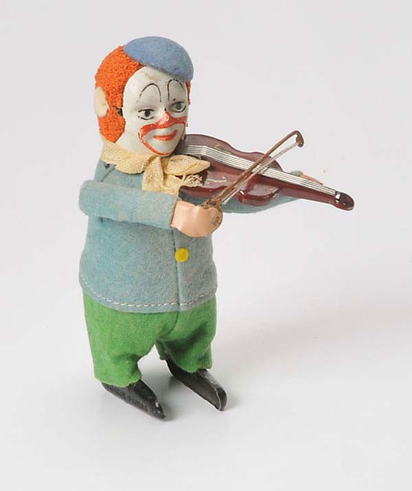 Schuco: Schuco, clown with violin, US Zone Germany, tin, windup ok, violin bow replaced, otherwise good condition Deutsche Beschreibung: Schuco, Clown mit Geige, US Zone Germany, 12 cm, Blech, Uhrwerk ok, Ge