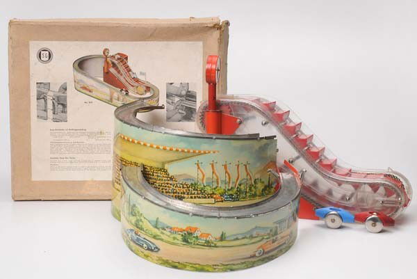 Günthermann: Günthermann, Speedway with moving stairs and three cars, original box condition 2-, complete ?, motor broken, drivers missing, for home constructors Beschreibung:Günthermann, Autorennbahn mit Rolltr