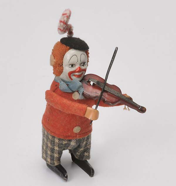 Schuco: Schuco, Clown and Violine, US Zone Germany, windup ok, condition 2 Beschreibung:Schuco, Clown mit Geige, 12 cm, US Zone Germany, Uhrwerk ok, Z 2, (11)