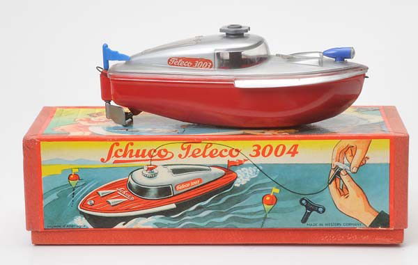Schuco: Schuco, Boat "Teleco", W.-Germany, plastic, windup ok, original box condition 1, with accessory, condition 1, Beschreibung: Schuco, Boot "Teleco", W.-Germany, Kunststoff, 17 cm, Uhrwerk ok, Okt Z 1, m