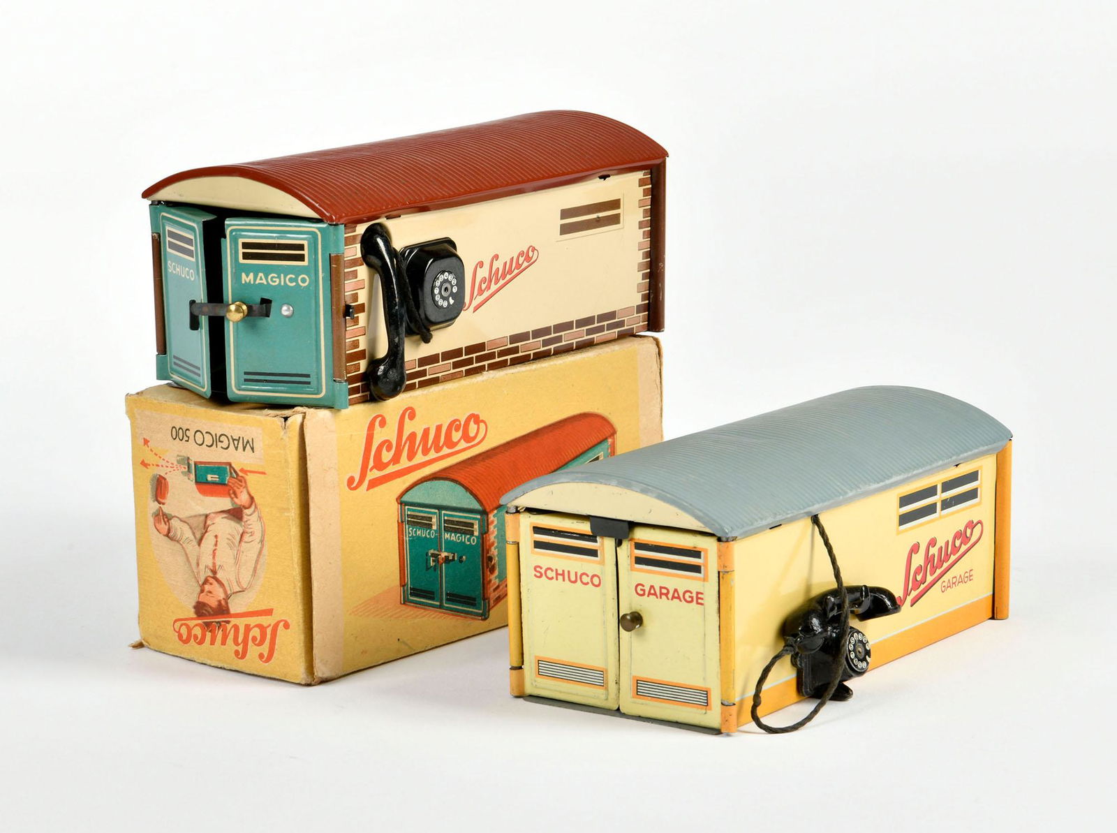 Schuco, 2 Magico Garagen: Schuco, 2 Magico Garagen, W.-Germany, 16 cm, Blech, 1x Okt, Z 1/1-2