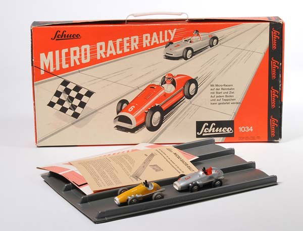 Schuco: English: Schuco, Micro Racer Rallye 1034, US Zone Germany, diecast, both windups ok, original box condition 1-, complete with accessory, condition 1 Deutsch: Schuco, Micro Racer Rallye 1034, Box 50x24