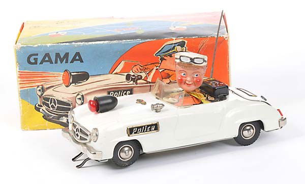 Gama: English: Gama, Comic Police Car, W.-Germany, tin, battery drive not checked, minimal paint damage, original box condition 1-2, condition 1- Deutsch: Gama, Comic Police Car, W.-Germany, 23 cm, Blech, E