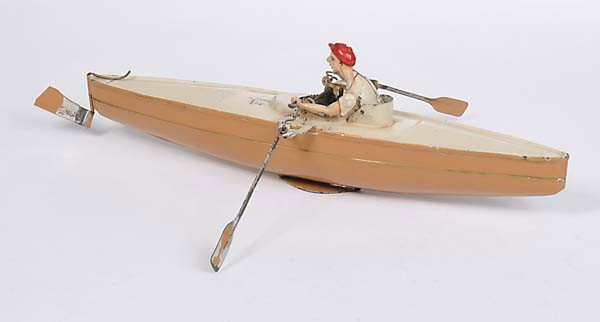 Bing: English: Bing, Rowboat with rower, Germany prewar, tin, paint damage due to age, 1910, very rare, good original condition Deutsch: Bing, Ruderboot mit Ruderer, Germany VK, 33 cm, Blech, Uhrwerk ok, al