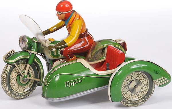 Tipp&Co: English: Tipp&Co, Motorcycle with Sidecar, W.-Germany, tin, windup defective, minimal paint damage, visually condition 1- Deutsch: Tipp&Co, Motorrad mit Beiwagen, W.-Germany, 19 cm, Blech, Uhrwerk def