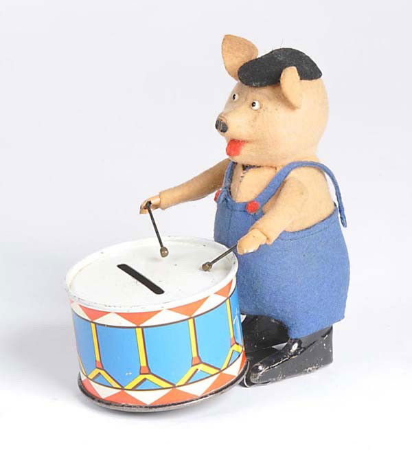 Schuco: English: Schuco, Dancing figure Pig and Saving Box No 980/1, Germany prewar, mixed material, windup ok, condition 1- Deutsch: Schuco, Tanzfigur Schwein mit Spardose Nr. 980/1, Germany VK, Gemischtbauw
