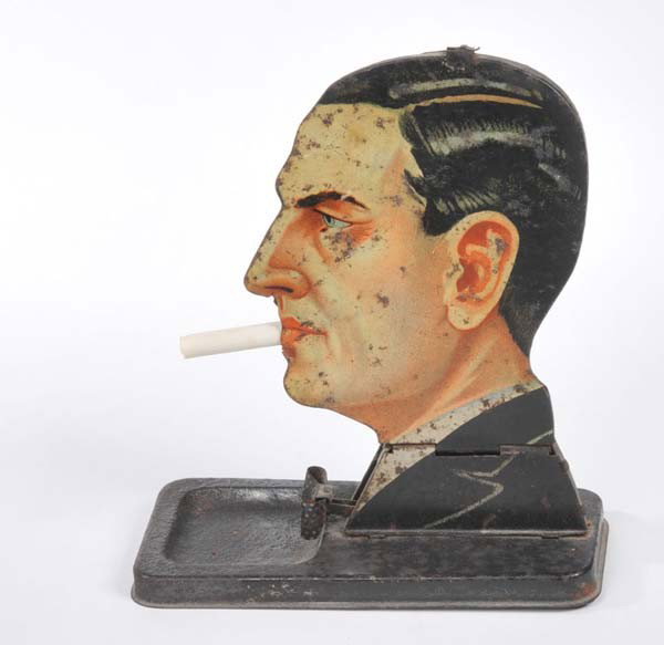 Kellermann: English: Kellermann, Cigarette Dispenser, Germany prewar, tin, paint damages, condition 3- Deutsch: Kellermann, Zigarettenspender, Germany VK, 18 cm, Blech, Lackmängel, Z 3-, (3509)
