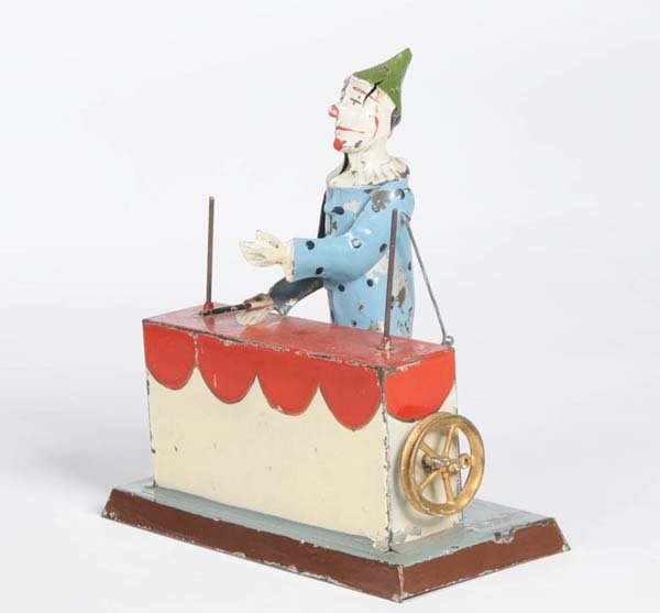 Guenthermann: English: Guenthermann, Magician Clown as Drive Model, Germany prewar, tin, age-related paint damage, handpainted, not complete Deutsch: Günthermann, Zaubernder Clown als Antriebsmodell, 16 cm, German