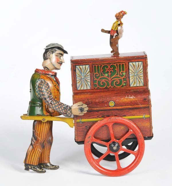 Distler: English: Distler, Organ Player, Germany prewar, tin, windup and music box, left arm missing, otherwise good condition 2 Deutsch: Distler, Orgelspieler, 16 cm, Germany VK, Blech, Uhrwerk und Spieluhr o