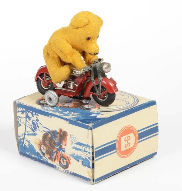 Guenthermann: English: Guenthermann, Bear on Motorbike, US Zone Germany, tin a.o., windup ok, reprobox, condition 2 Deutsch: Günthermann, Bär auf Motorrad, 12 cm, US Zone Germany, Blech u.a., Uhrwerk ok, Reprobox