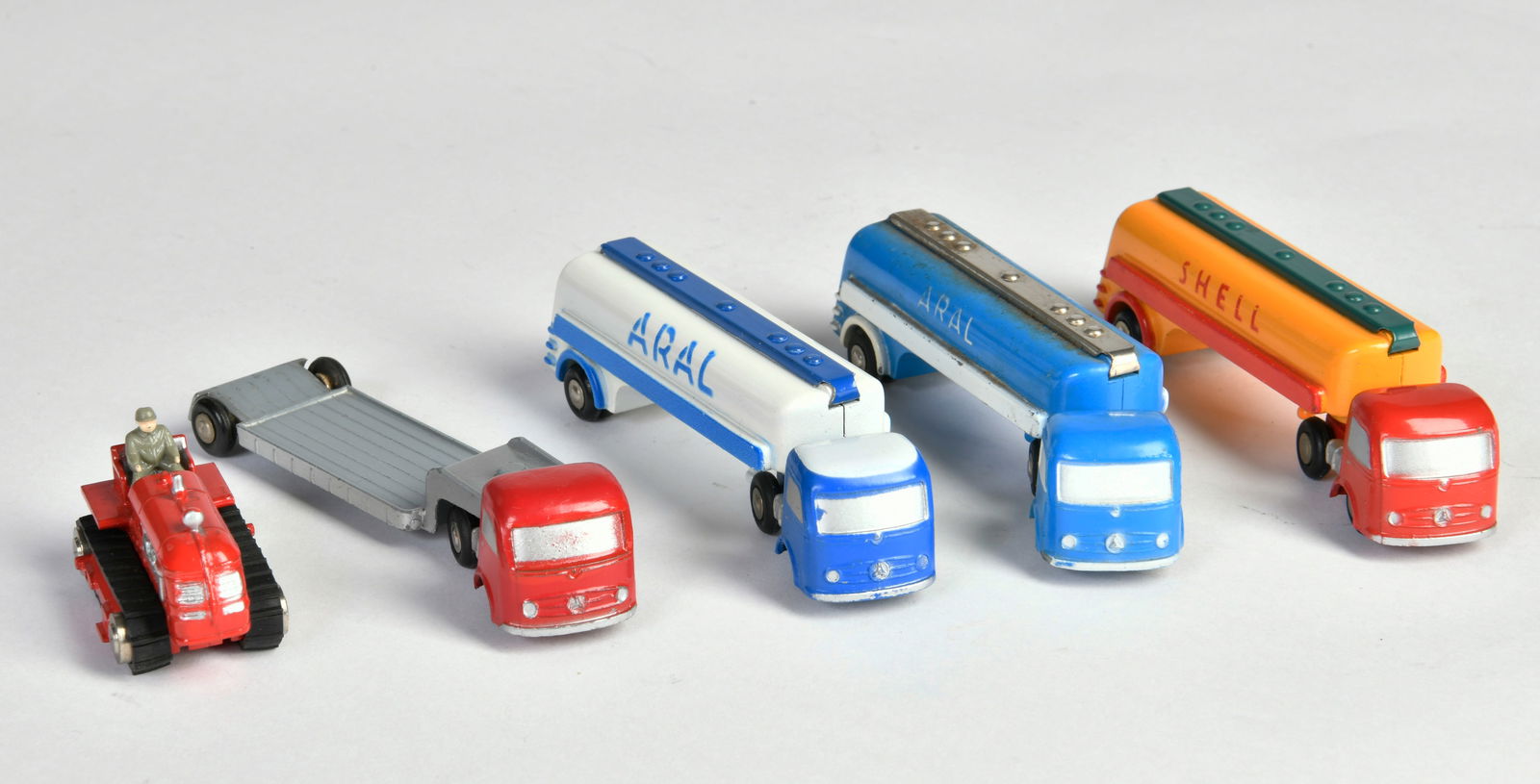 Schuco, 4 Piccolo Sattelschlepper + Raupe, W.-Germany (1 of 1)