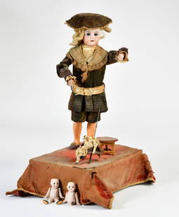 Lambert & Bourgeois, Automat Junge mit Wippe: Lambert & Bourgeois, Automaton boy with seesaw ("le Corneille voltigeure") on socle, France, 60 cm, wooden and metal constructed body with bisque porcelain head made by Simon a. Halbig (marked 1300-7