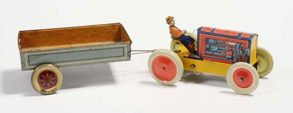 Guenthermann: English: Guenthermann, tractor, Germany prewar, tin, windup ok, paint damage, + one axle trailer (Gama?), condition 2- Deutsch: Günthermann, Traktor, 13,5 cm, Germany VK, Blech, Uhrwerk ok, Lackmäng