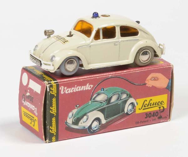 Schuco: English: Schuco, Variant VW "Politie", W.-Germany, tin, windup ok, minimal paint damage, 2 wheels age-related flat, original box condition 1-, condition 2 Deutsch: Schuco, Variant VW "Politie", W.-Ger