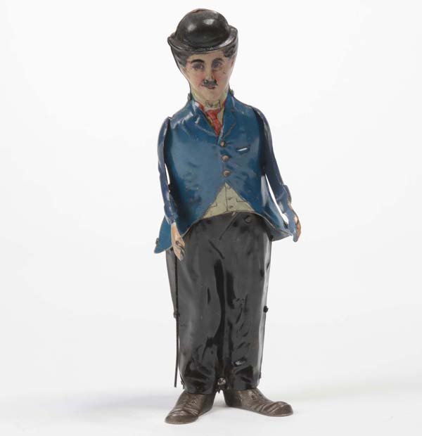 Guenthermann: English: Guenthermann, Charly Chaplin, Germany prewar, tin, windup ok, paint damage due to age, condition 2+ Deutsch: Günthermann, Charly Chaplin, Germany VK, 22cm, Blech, Uhrwerk ok, altersbedingte