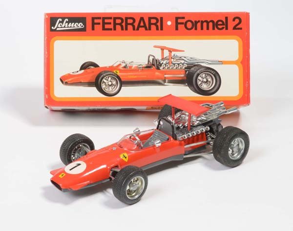 Schuco: English: Schuco, Ferrari racing car, W.-Germany, mixed material, windup ok, original box condition 1, condition 1, Deutsch: Schuco, Ferrari Rennwagen, W.-Germany, 24 cm, Gemischtbauweise, Uhrwerk ok.,