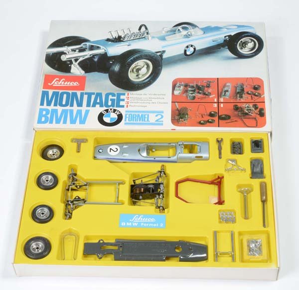 Schuco: English: Schuco, assembly "BMW" racing car, W.-Germany, mixed material, original box condition 1, condition 1 Deutsch: Schuco, Montage "BMW" Rennwagen, Box 29x44 cm, W.-Germany, Gemischtbauweise, Orig