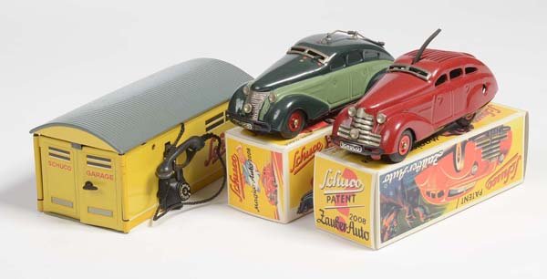 Schuco: English: Schuco, Magico 2008, Radio 5000, Garage, tin, windup ok, original box condition 1, repros of the 90s, condition 1- Deutsch: Schuco, Magico 2008, Radio 5000, Garage, 13 - 14 cm, Blech, Uhrwerk