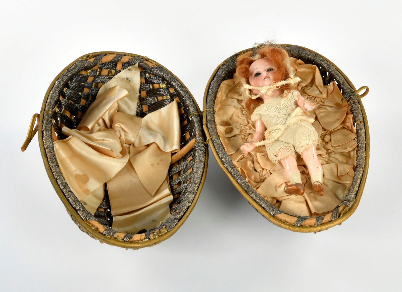 Heubach, Puppchen im Osterei: Heubach, doll in Easter egg, Germany pw, 17/24 cm, bisque head (marked "Heubach Koppelsdorf 250-17/0 Germany") on composite body with rabbit cap, mohair wig, fixed eyes, open mouth, 4 teeth, traces of