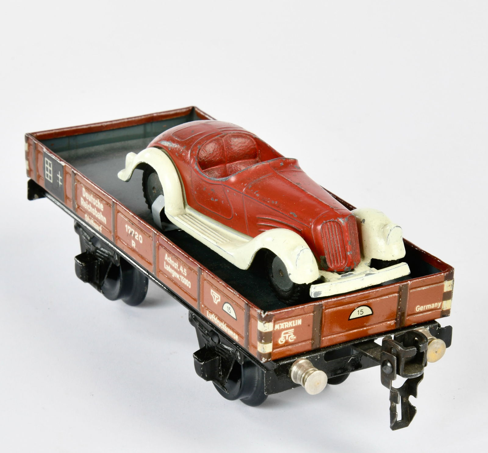 Marklin, Niederbordwagen mit Sportwagen 5521/51: Marklin, wagon with sports car 5521/51, Germany pw, gauge 0, tin, diecast, paint d., bracket replaced, C 3