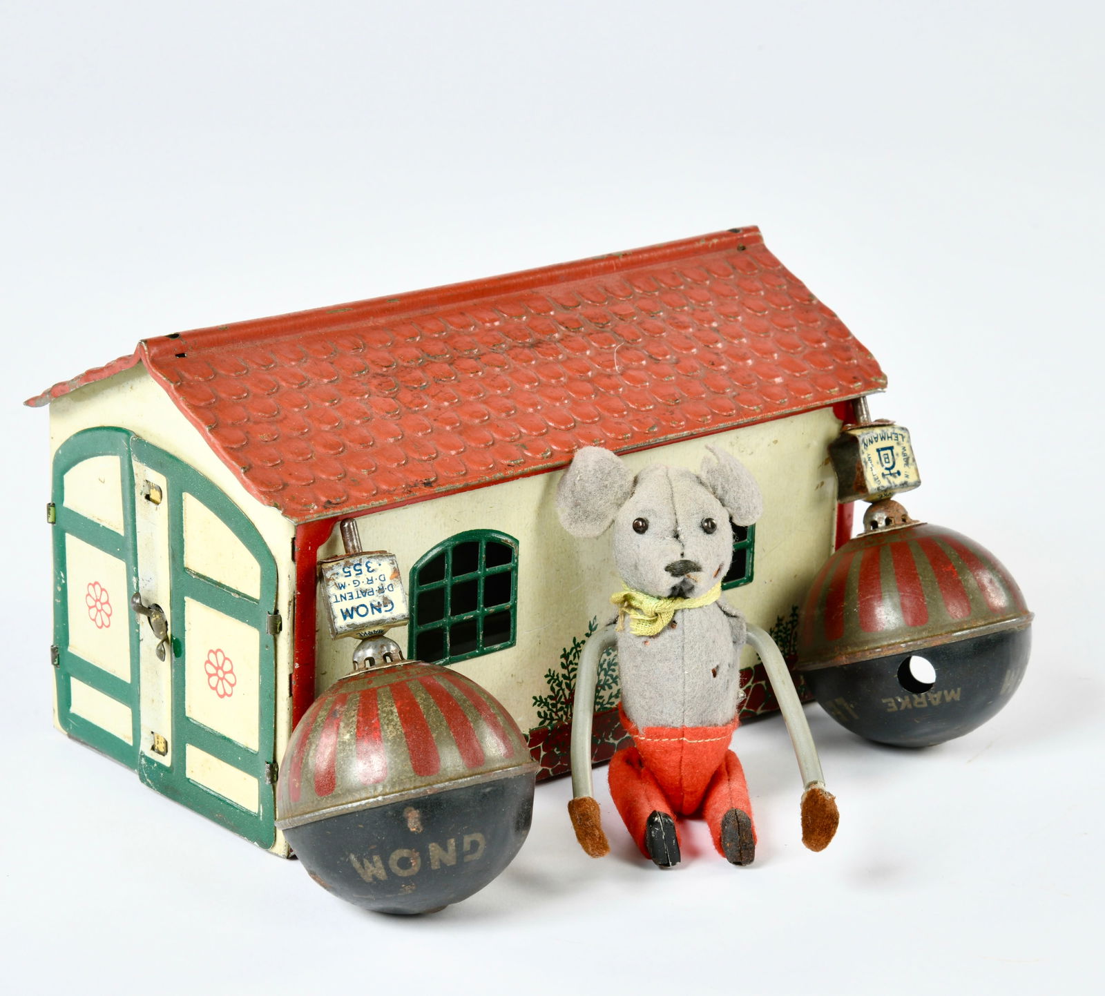 Lehmann, Garage, 2 Kreisel und Schuco Turnmaus: Lehmann, garage, 2 spinning tops and Schuco tumbling mouse, Germany, part. paint d., C 2-3