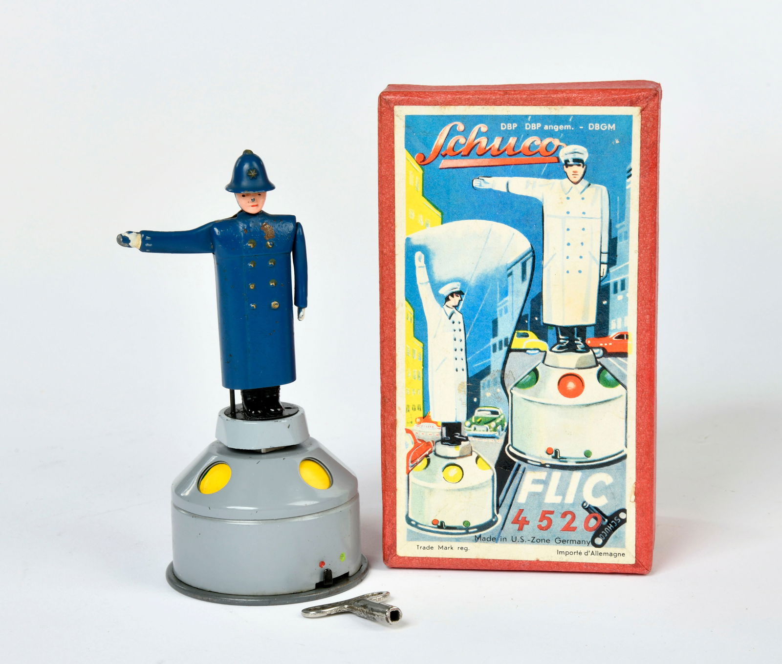 Schuco, Flic Bobby 4520: Schuco, Flic Bobby 4520, US Z. Germany, 13 cm, tin, cw ok, min. paint d., box , C 2