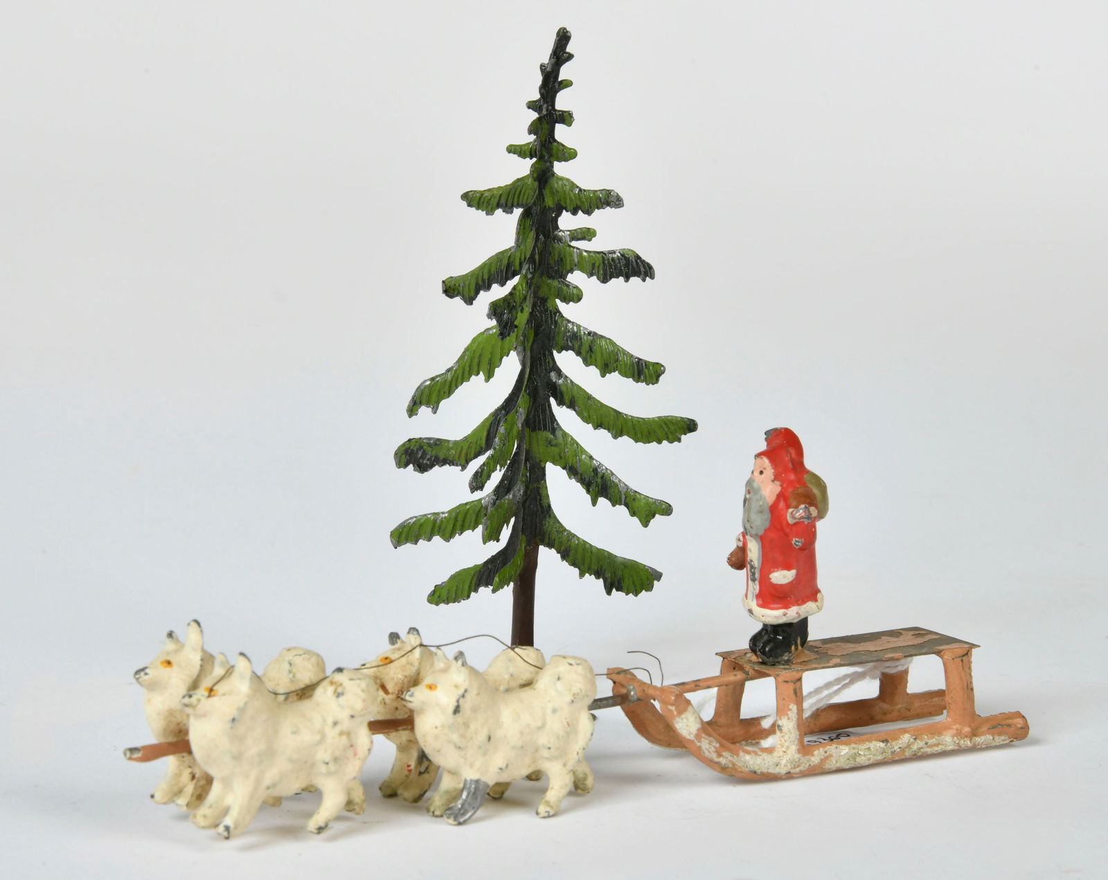 Heyde, Weihnachtsmann auf Hundeschlitten: Heyde, Santa Claus on doog sleigh, with tree, Germany, miniature, sleigh 13 cm, min. paint d.