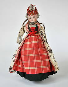 Trachtenpuppe: Folk costume doll, around 1900, 42 cm, bisque head on fabric body, porcelain arms, real hair, sleep eyes, mouth closed, original clothing and headdress (jewelry attached), slightly dirty/foxed, otherw