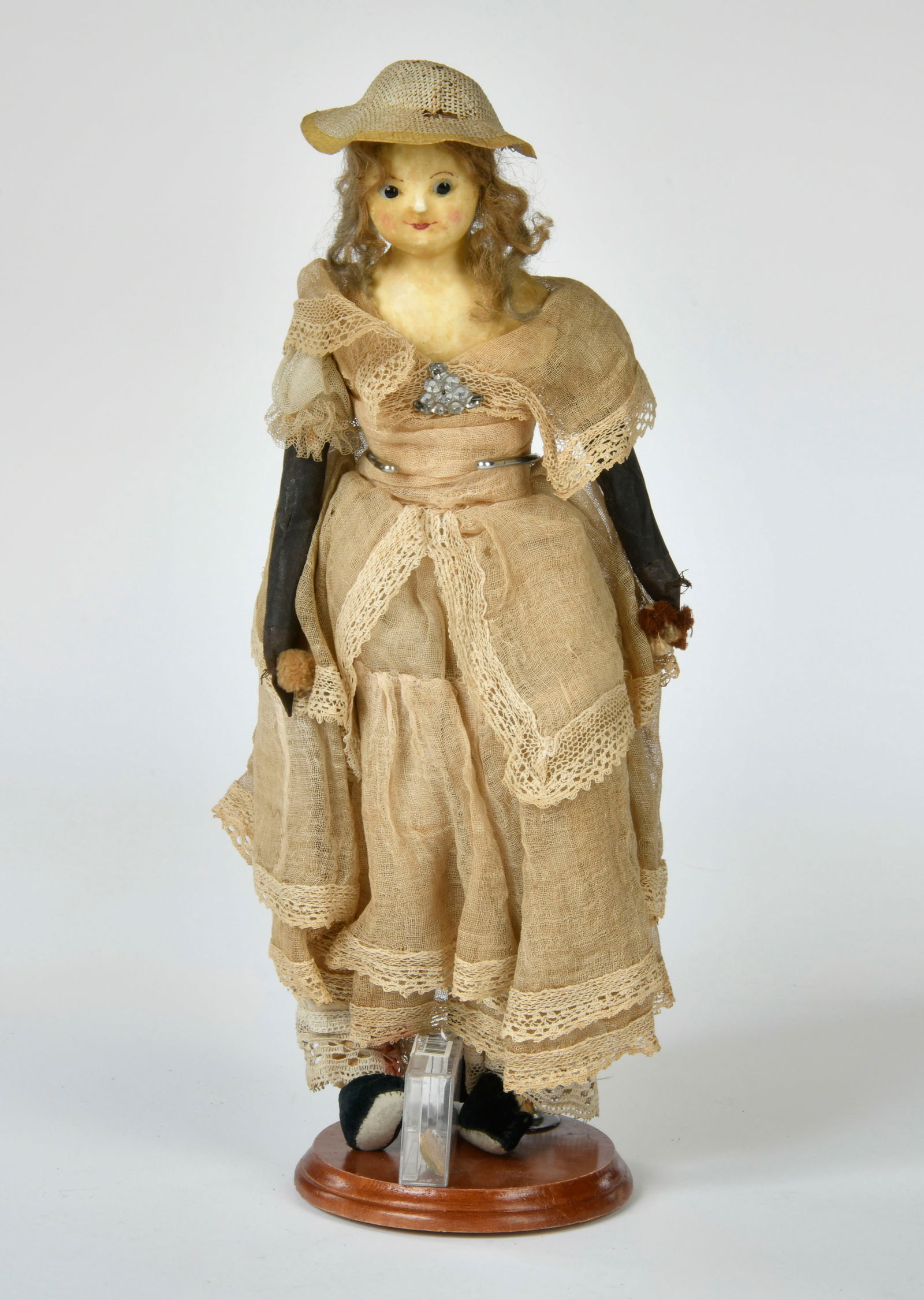Wachspuppe: Wax doll, England around 1850, 39 cm, waxed paper mache head, fabric body with arms of leather, glass eyes, original clothes (hat damaged, shoes new), traces of age and use, nice expression