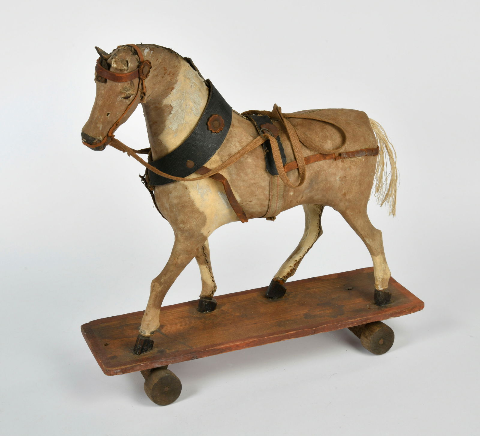 Pferd auf Rollwagen: Horse on platform on wheels, 19th century, 35 x 35 cm, mixed constr., traces of age, otherwise nice condition
