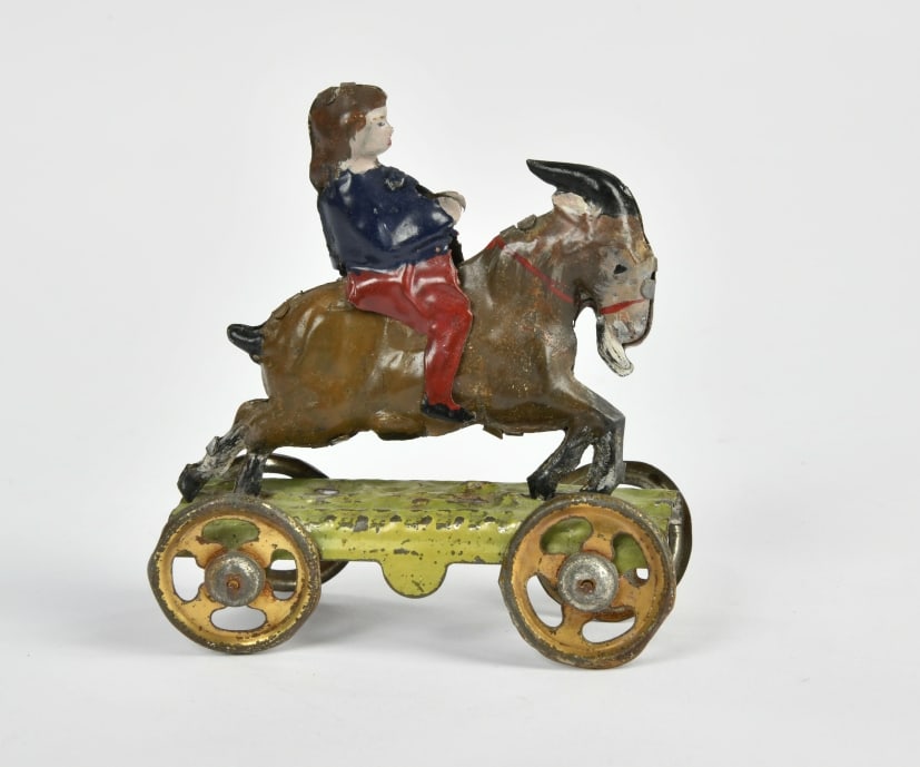 Kind auf Ziege Penny Toy (1 of 1)